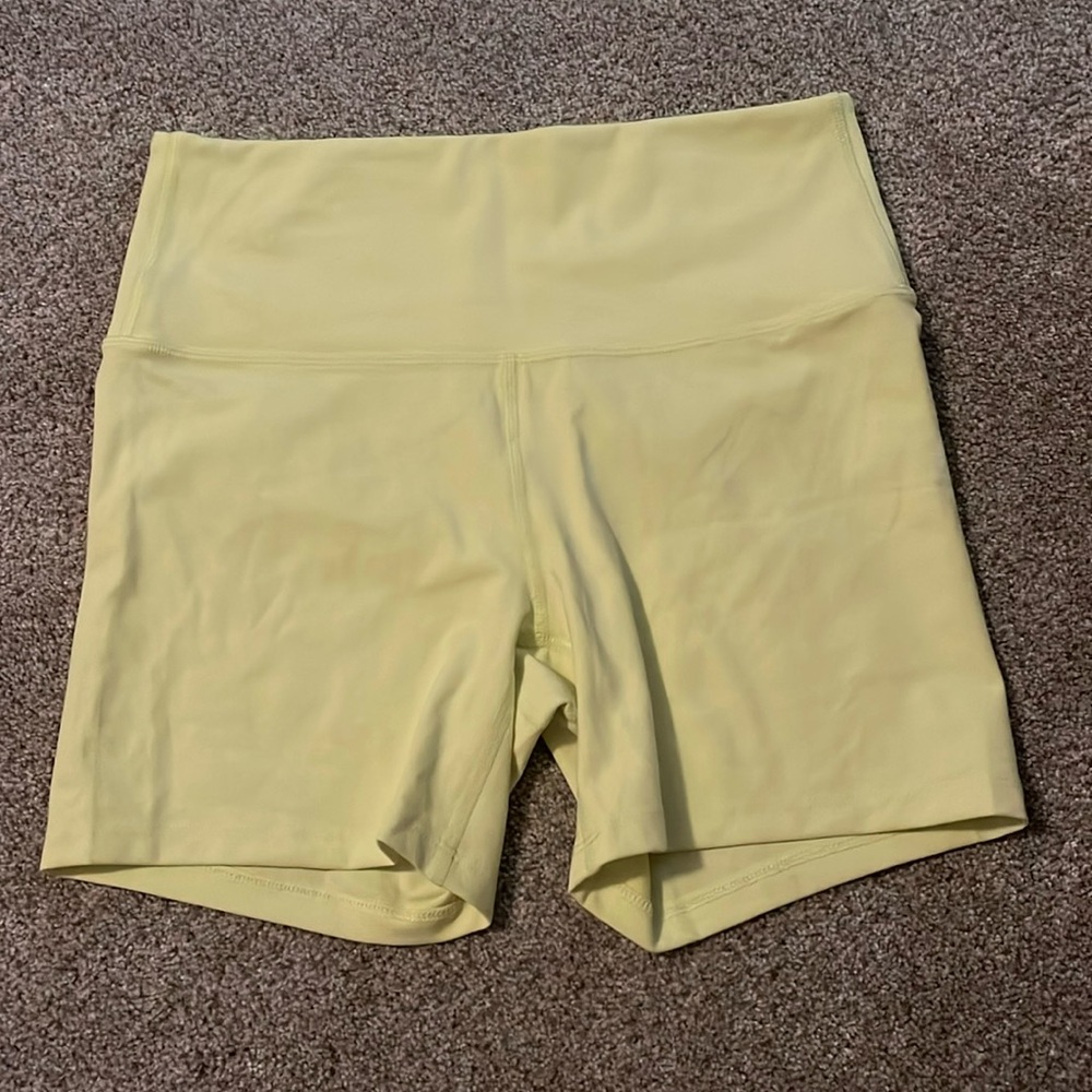 Adorable yellow biker shorts! Never wornSize Medium. They are the cutest yellow